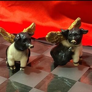 Vintage America Black and Gold Winged Pig Figurines